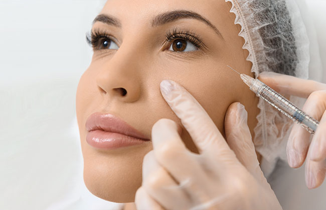 Patient receiving botox at Skinlastiq Medical Laser Cosmetic Spa in Burlingame