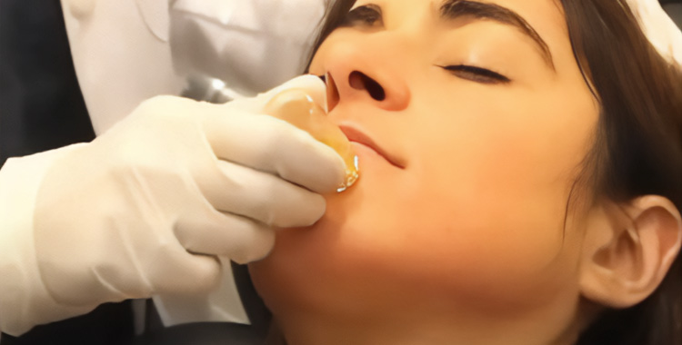 Patient receiving Aquagold® Facial at Skinlastiq Medical Laser Cosmetic Spa in Burlingame